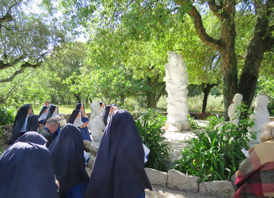 The Sisters kneel and pray the Fatima Prayers at the well where the Angel of Portugal appeared to the children the second time.